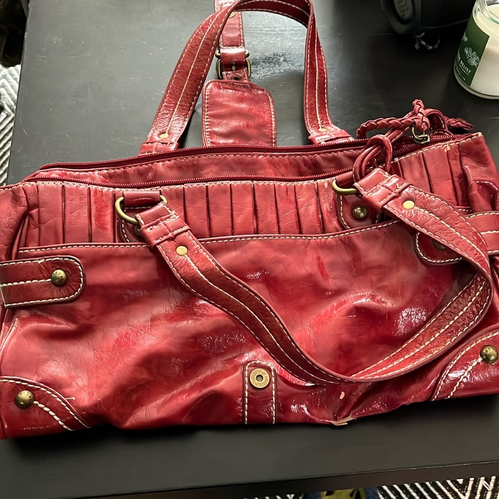 Red by Marc Ecko red leather purse. Good used condition as shown in pictures.